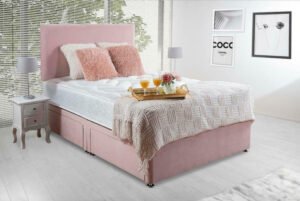 pink double bed with mattress